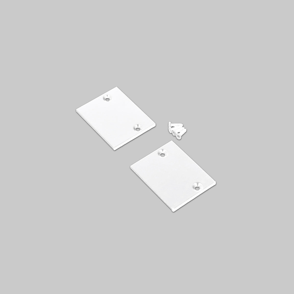 Two rectangular white End Cap for Pixel33-01 Profile pieces with corner holes, plus one small, uniquely shaped metal piece, displayed on a plain light gray background.