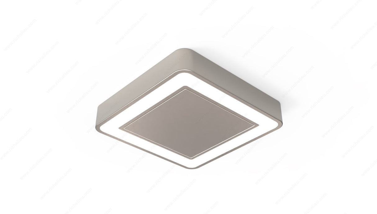 The HIPSO D-MOTION TDM is a modern, square recessed/surface mount under-cabinet LED light with a minimalist design and illuminated border, ideal for contemporary interiors. Shown on a plain white background.