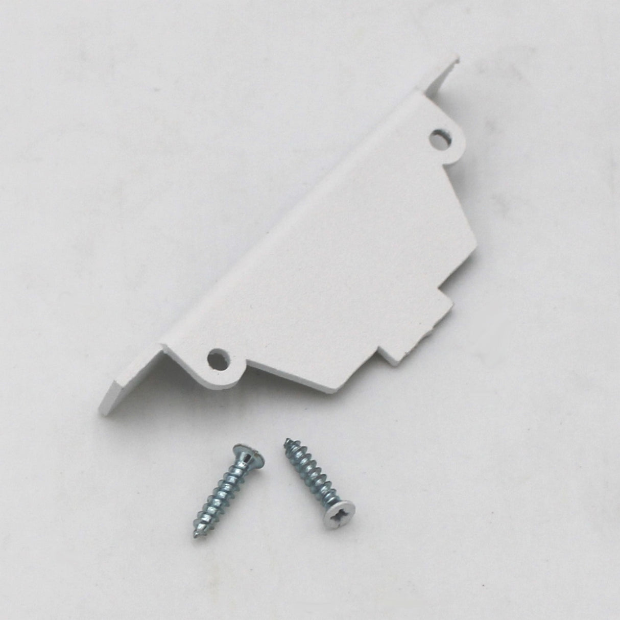 The End Cap for Amara Profile is a small white aluminum bracket with two screw holes, displayed beside two silver screws against a plain white background.