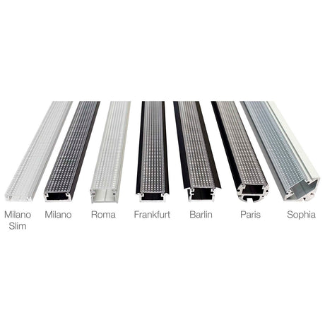 Seven Black Light Microprism Diffusers for Easy-On Profiles are shown upright in a row, each labeled Milano Slim, Milano, Roma, Frankfurt, Barlin, Paris, or Sophia—highlighting different shapes and perforation styles.