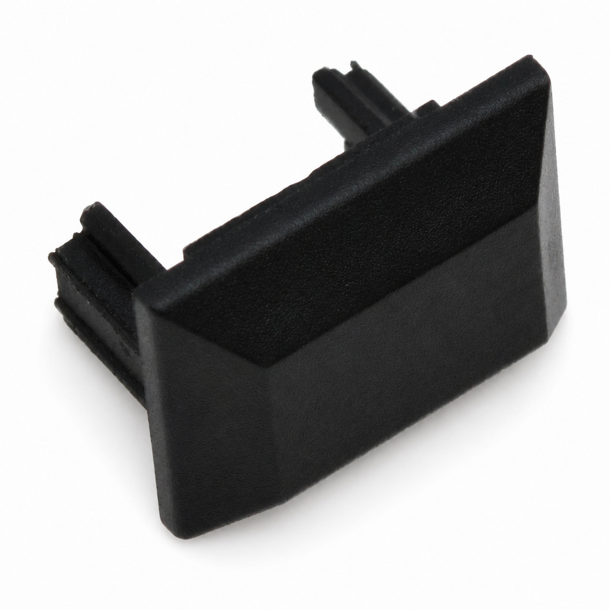The Cut & Connect End Cap for Roma Profile is a black plastic rectangular insert designed to cover the open ends of square tubes or pipes in linear lighting systems, delivering a neat finish and an IP65 seal that protects internal components.