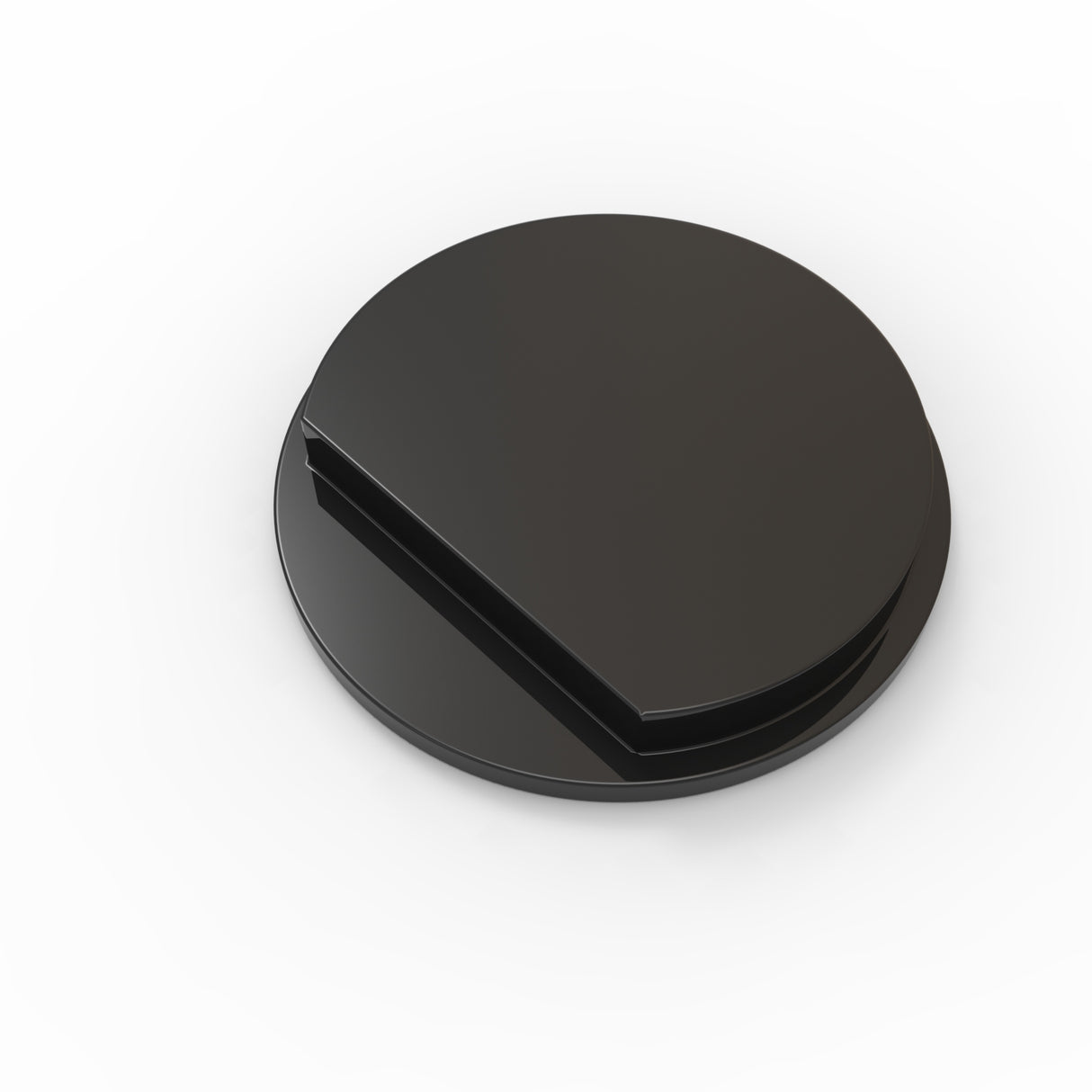 A black, round Plastic End Cap for Sierra38 Profile, resembling a flat disc with a wedge-shaped section cut out, is displayed on a white background.