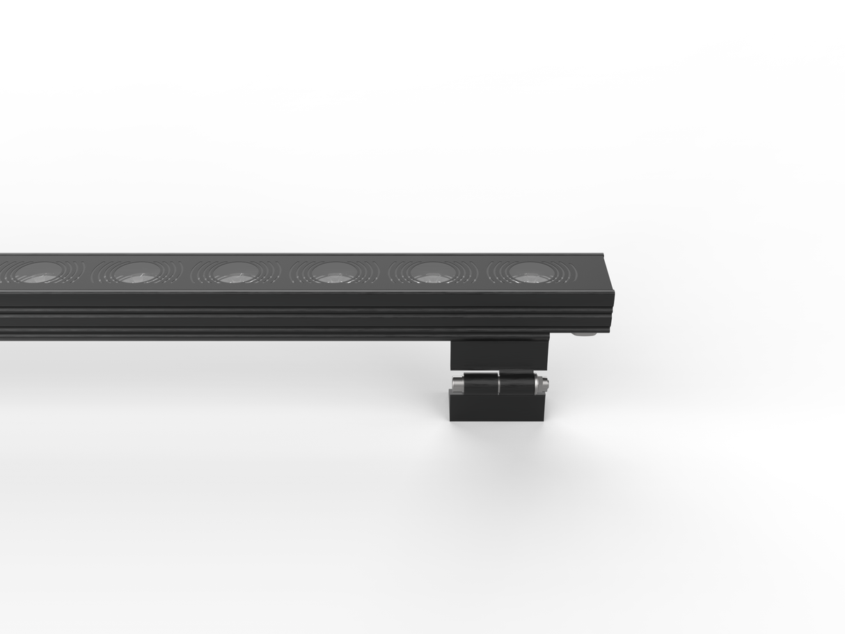 A partially visible LED Wall Washer Light, Model Alphaeus 3 MO50, features a black rectangular body with a row of circular LEDs and is mounted on a metallic bracket against a plain white background.