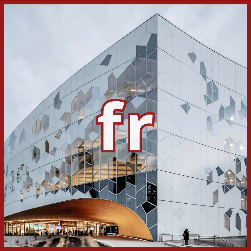 A modern library with geometric windows and a wood-accented entrance features ALPOLIC/fr Series fire-resistant aluminum composite panels, framed in red with bold white and red fr letters at the center.