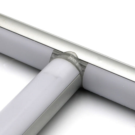 Close-up of a T Joiner for Alu-Round Profile connecting two white and silver metallic rods, likely as part of a structural assembly.
