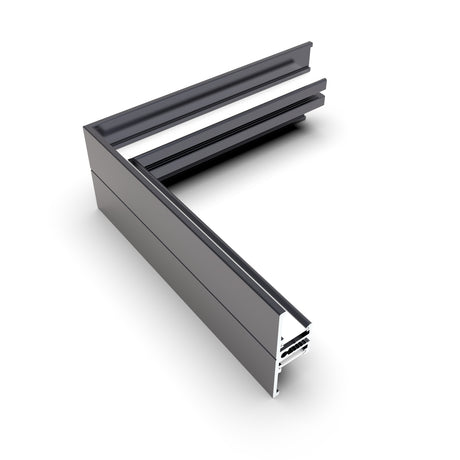 A 3D rendering of a dark gray 90 Degree Corner Connector for Back10 Profile, showing internal channels and grooves ideal for LED integration, set against a white background.