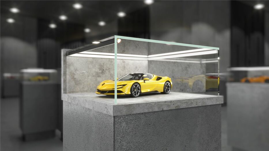 A yellow sports car is showcased inside a glass case featuring the Corner LED Channel ~ Model Cabi12 Duo on a concrete pedestal in a modern gray-walled showroom, with other retail displays visible in the background.