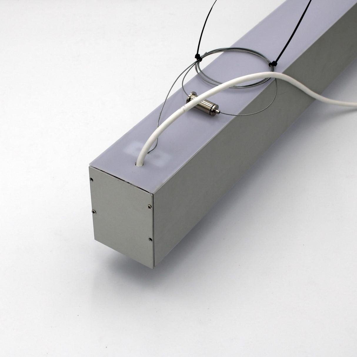 A surface/pendant mounting bracket for DPL55, DPL70FL LED profile is shown attached to a rectangular gray fixture with white power cable and two hanging wires, all displayed on a plain white background.