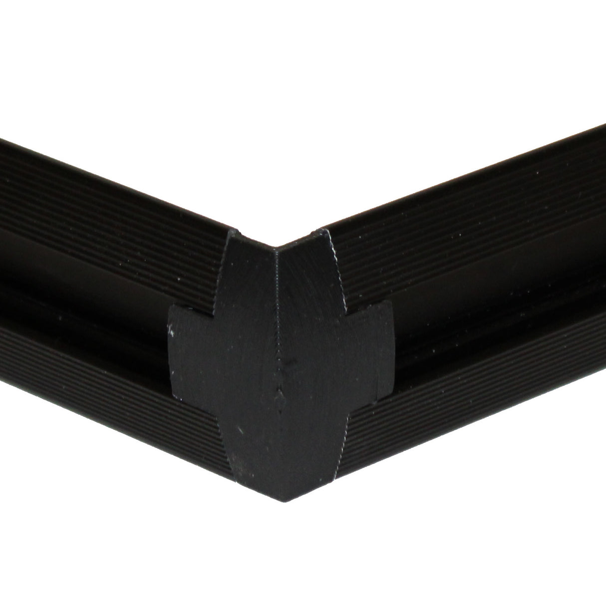 Close-up of a Plastic Corner Connector for Dubai Profile, joining two black frame sections at a right angle with a clean, mitered edge.