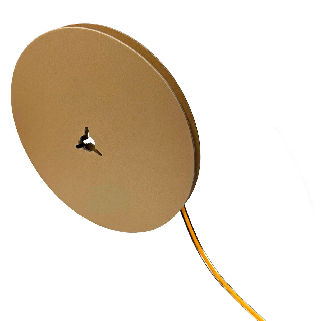 A large, round, brown cardboard spool with a small center hole and three slits holds a coiled length of Narrow COB IP20 High CRI LED Strip (24V) ~ Elite Gold Slim Series, extending out to the right.