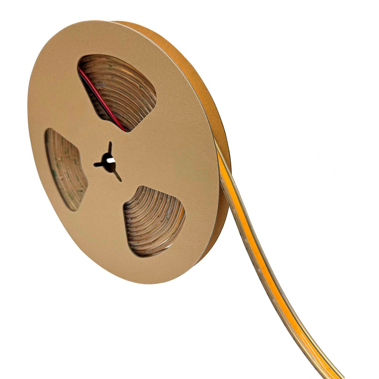 A large brown cardboard reel with cut-outs holds a partially unwound strip of Elite Gold Series Waterproof COB IP67 High CRI LED Strip (24V) flexible lighting, extending out from the reel.