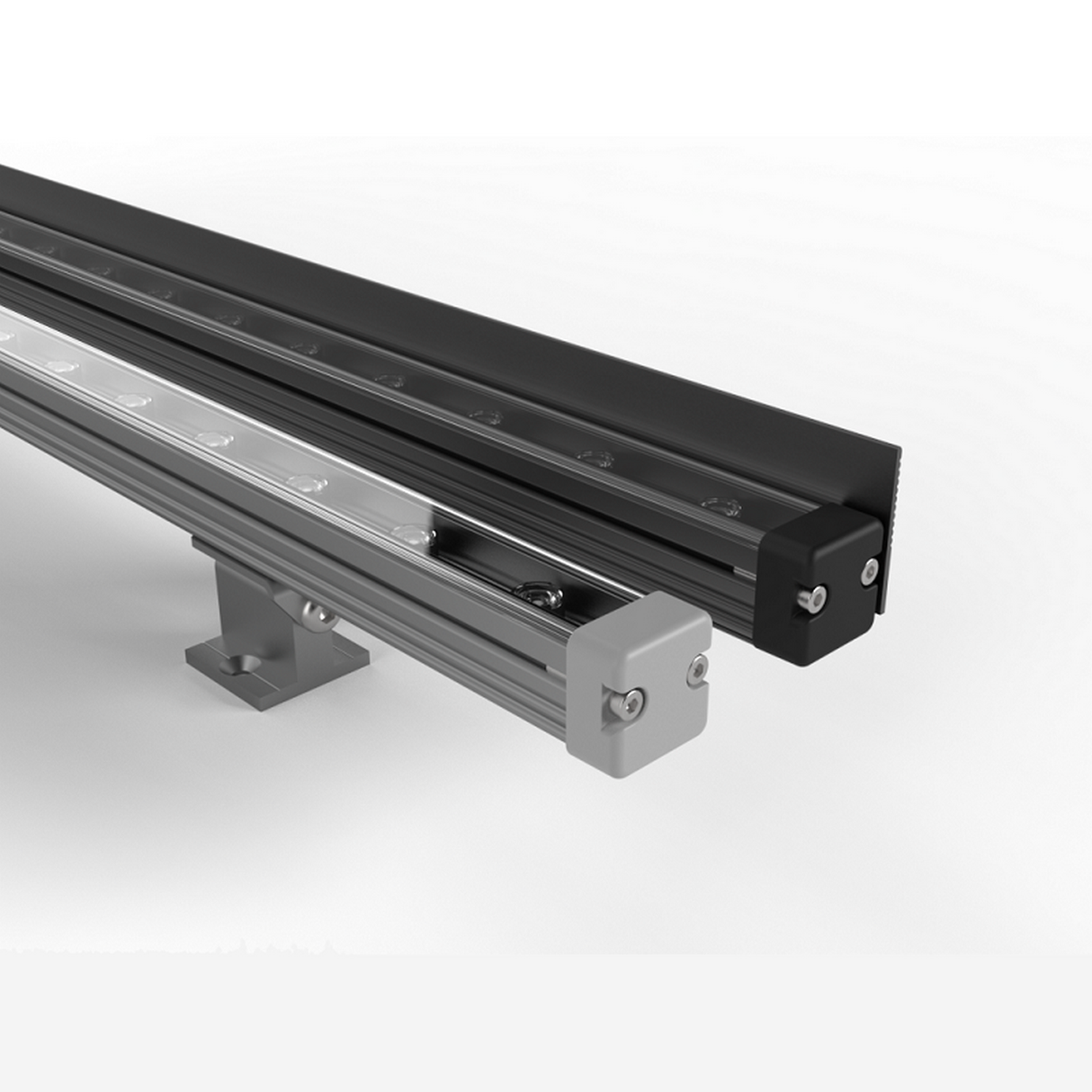 Two Fortis 3 Series Linear LED Wall Washer Lights, one gray and one black, are mounted on metal brackets against a plain white background. Each has a clear lens cover and is parallel—ideal for architectural lighting.