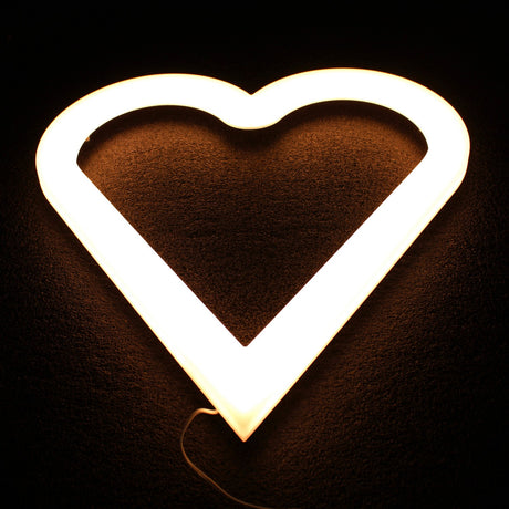 The Heart Shaped Light Fixture features a glowing white heart design that illuminates its surroundings with modern lighting, creating a stylish accent on any dark surface.