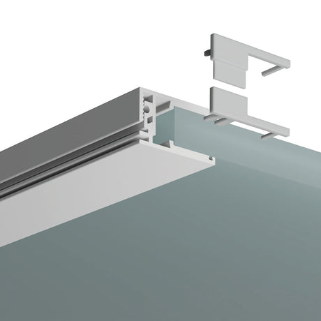 A close-up of the End Cap for KRAV-810 Profile on a white metal track with a transparent glass panel and two detachable brackets, showing how the brackets connect to the KRAV-810 system.