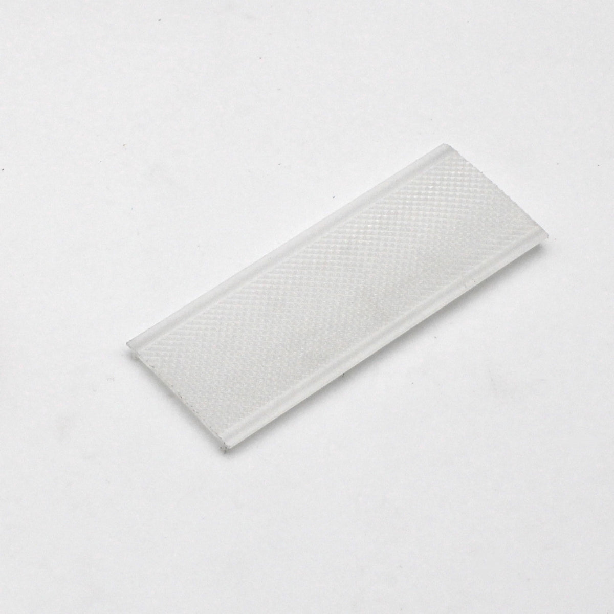 A single LED Diffuser for Easy-On Slim/Mini Architectural Profiles, white and rectangular with a textured surface, is displayed on a plain white background.