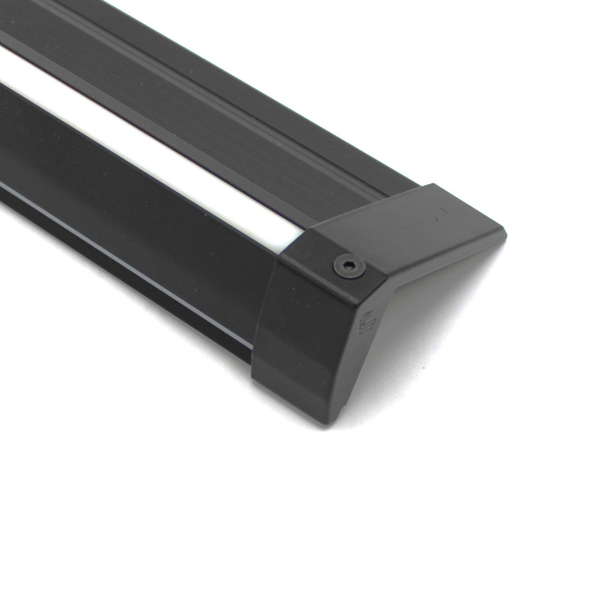 Close-up of the End Cap for Niza Duo, a black, rectangular cast aluminum component with an angled end cap and visible screws, isolated on a white background.