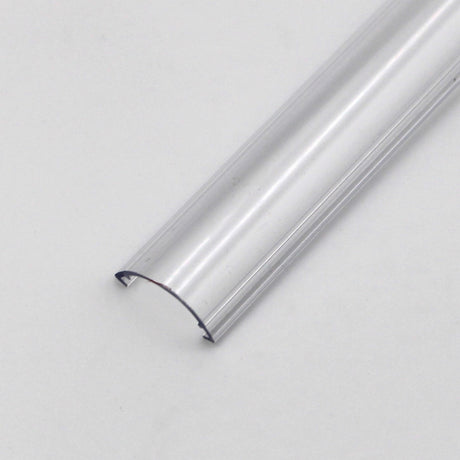 The Diffuser for Alu-Round profile is a clear, semi-circular plastic piece shown resting on a plain white surface with its open side facing down and both ends visible.
