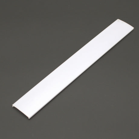 A white, flat, rectangular plastic Diffuser for SLW10, ALU45-Wide profile with slightly raised edges rests on a dark gray surface.