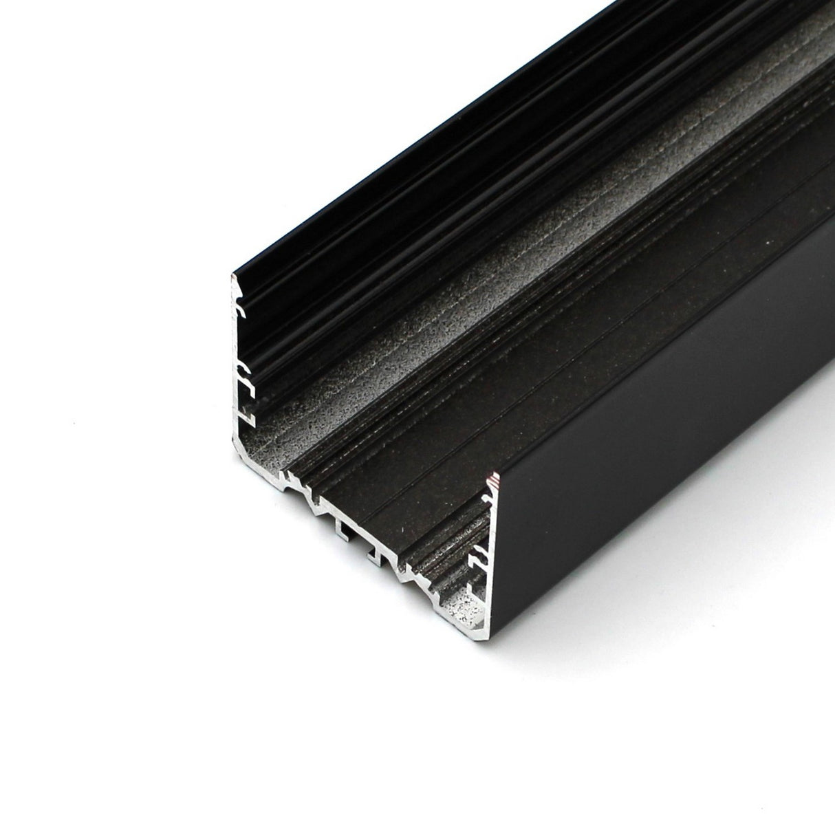 A close-up of the 2 Wide Aluminum Linear LED Lighting Profile (Model PL55-FL), featuring a black hollow rectangular design with side grooves, ideal for framing, structural support, or integrating diffusers in construction or DIY projects.