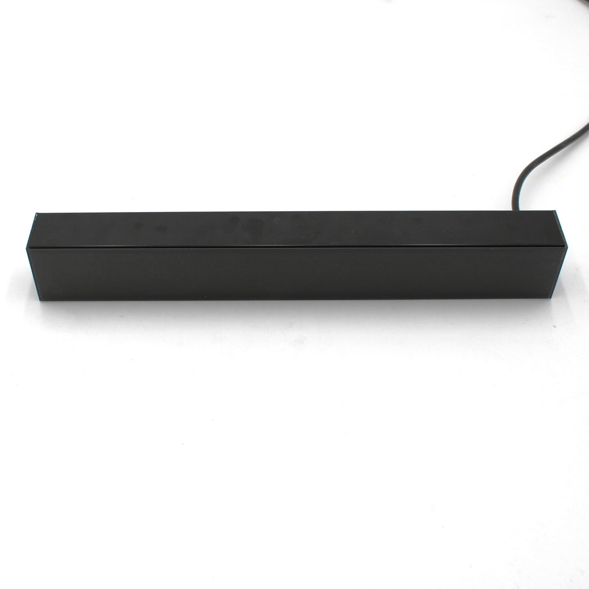A rectangular black bar sensor with a right-side cable, shown on a white surface, is compatible with the 2 Wide Aluminum Linear LED Lighting Profile Model PL55-FL and supports various diffuser options.