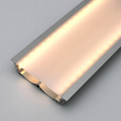 A close-up of the 4.5 Large Recessed LED Channel (Model RPLW116) with a frosted cover, emitting warm white light and delivering extra-wide illumination, set against a plain white background.