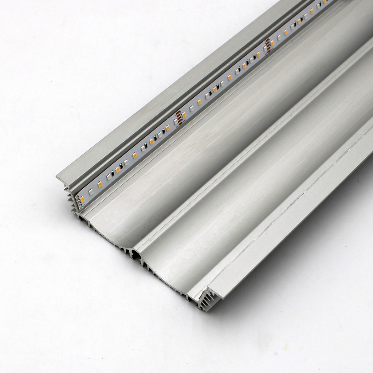 Close-up of a 4.5 Large Recessed LED Channel (Model RPLW116) in silver, featuring an embedded LED strip with visible LEDs and a linear heat sink, displayed on a plain white background.