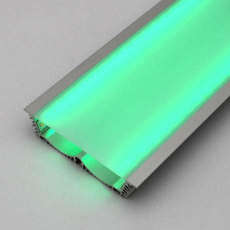 The 4.5 Large Recessed LED Channel (Model RPLW116) features a silver metal frame and emits a bright green glow with extra-wide light output, displayed on a neutral gray surface.