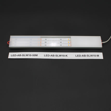 A rectangular LED fixture is shown on a black background, featuring three SLW10 strips and a sleek diffuser for SLW10, ALU45-Wide profile that enhances its modern look.