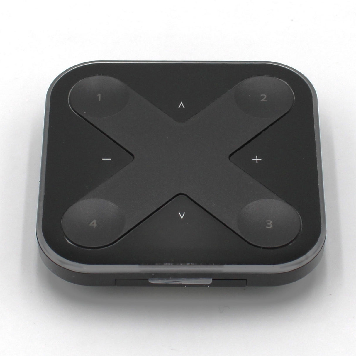 The Casambi basicDIM Bluetooth LED Wall Remote Control (Model Xpress-LR) is a black, square remote with rounded corners and four numbered buttons at each corner, plus arrow and +/- symbols in an X pattern for wireless lighting control.