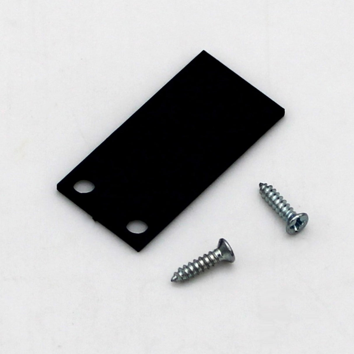 The End Cap for Hannover Profile is a black rectangular plastic bracket with two holes on one end, displayed beside two silver screws on a plain white background.