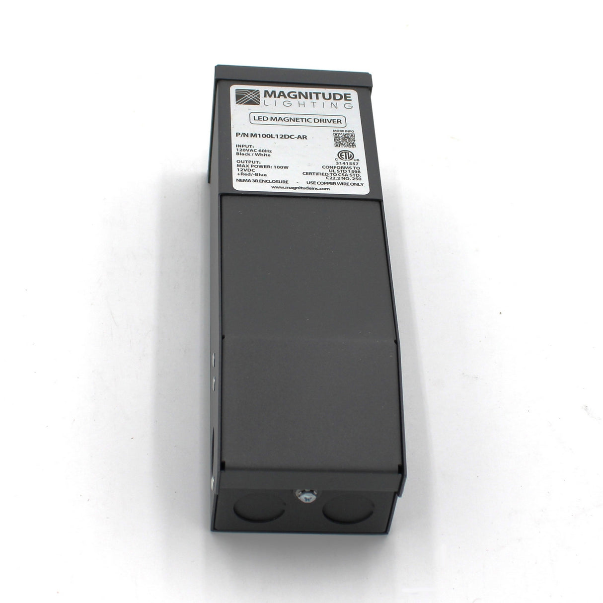 A black, rectangular Dimmable Magnetic Core LED Driver (12V) ~ Magnitude M Series with a white specs label on top, shown on a white background. Compatible with TRIAC dimmers for smooth phase-dimmable lighting control.