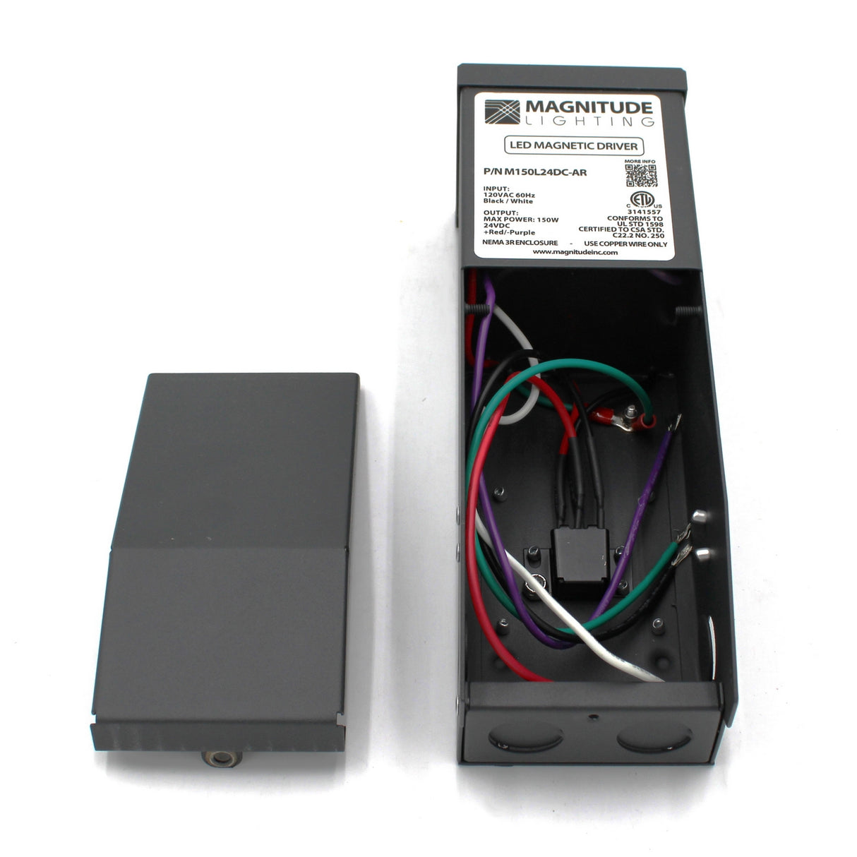 A Magnitude M Series Dimmable Magnetic Core LED Driver (24V) is shown on a white background with its black rectangular cover removed, revealing the internal wiring and components placed beside the cover.