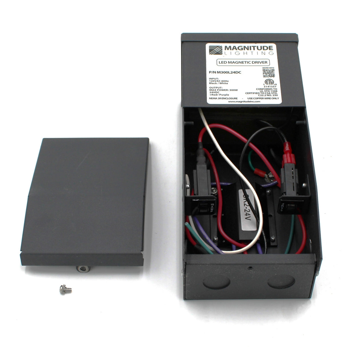 An open Dimmable Magnetic Core LED Driver (24V) ~ Magnitude M Series with exposed wires, components, a detached cover, and a small screw beside it. The label displays the Magnitude Lighting brand.