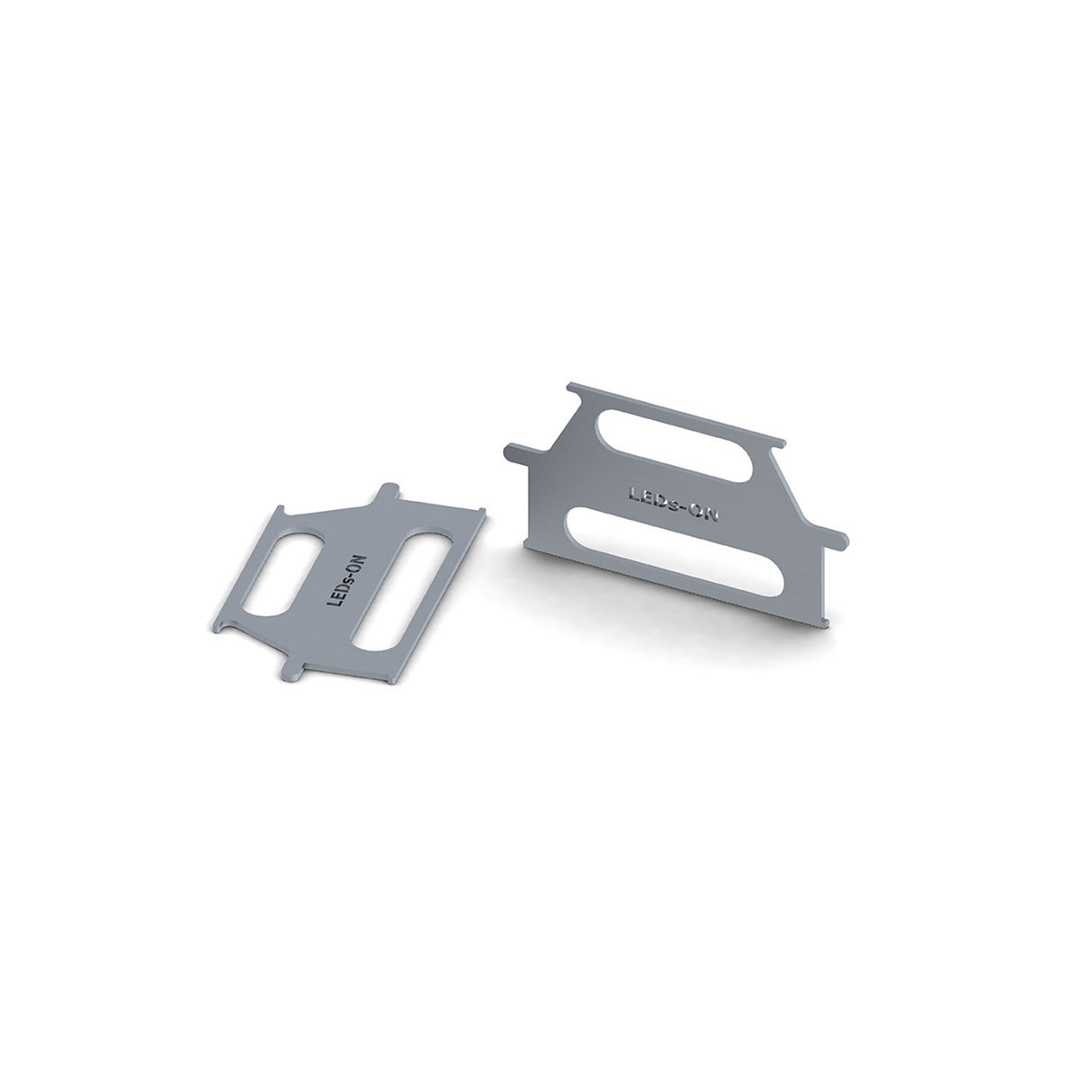 Two flat, rectangular galvanized steel Positioning Keys for trimless base installation with SPLW116 LED profile, each engraved HAFELE and featuring rounded cutouts; one lies flat, the other stands upright against a white background.