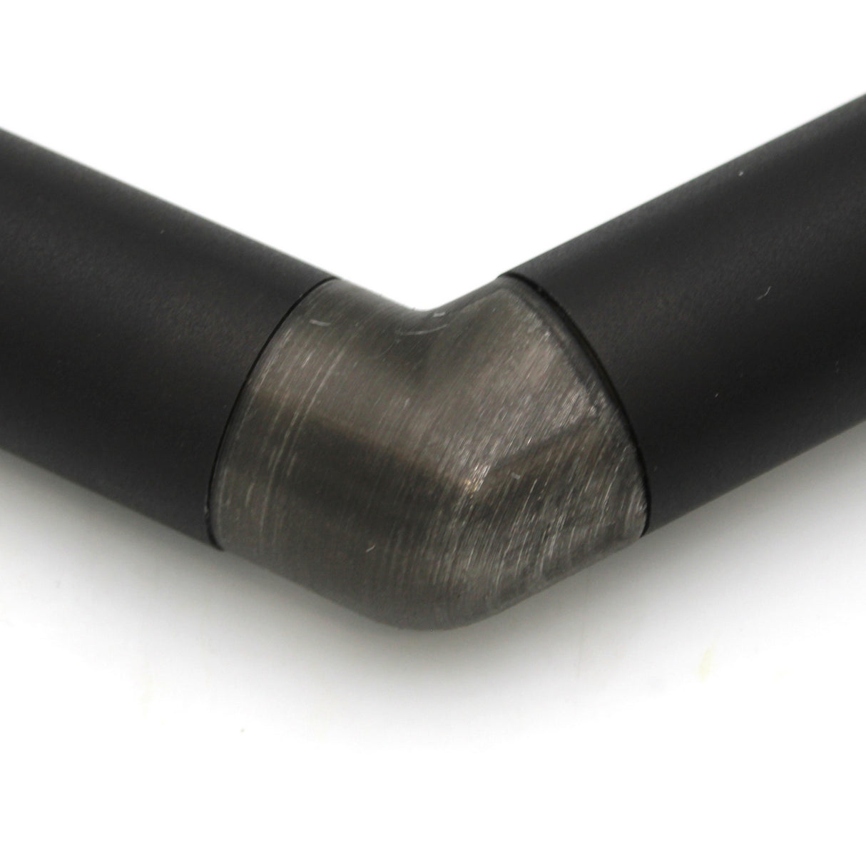 Close-up of a Translucent Elbow for Oslo Profile, featuring a right-angle connection between diffuser tubes, with a brushed silver finish, set against a white background.
