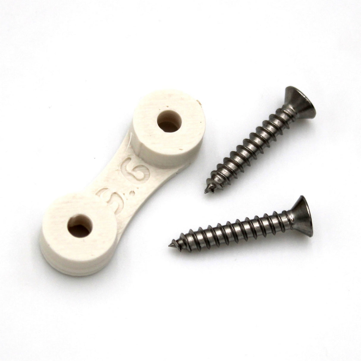 The LED Strip Saddle, a small white plastic bracket for waterproof LED strips, is shown next to two silver screws on a white background.