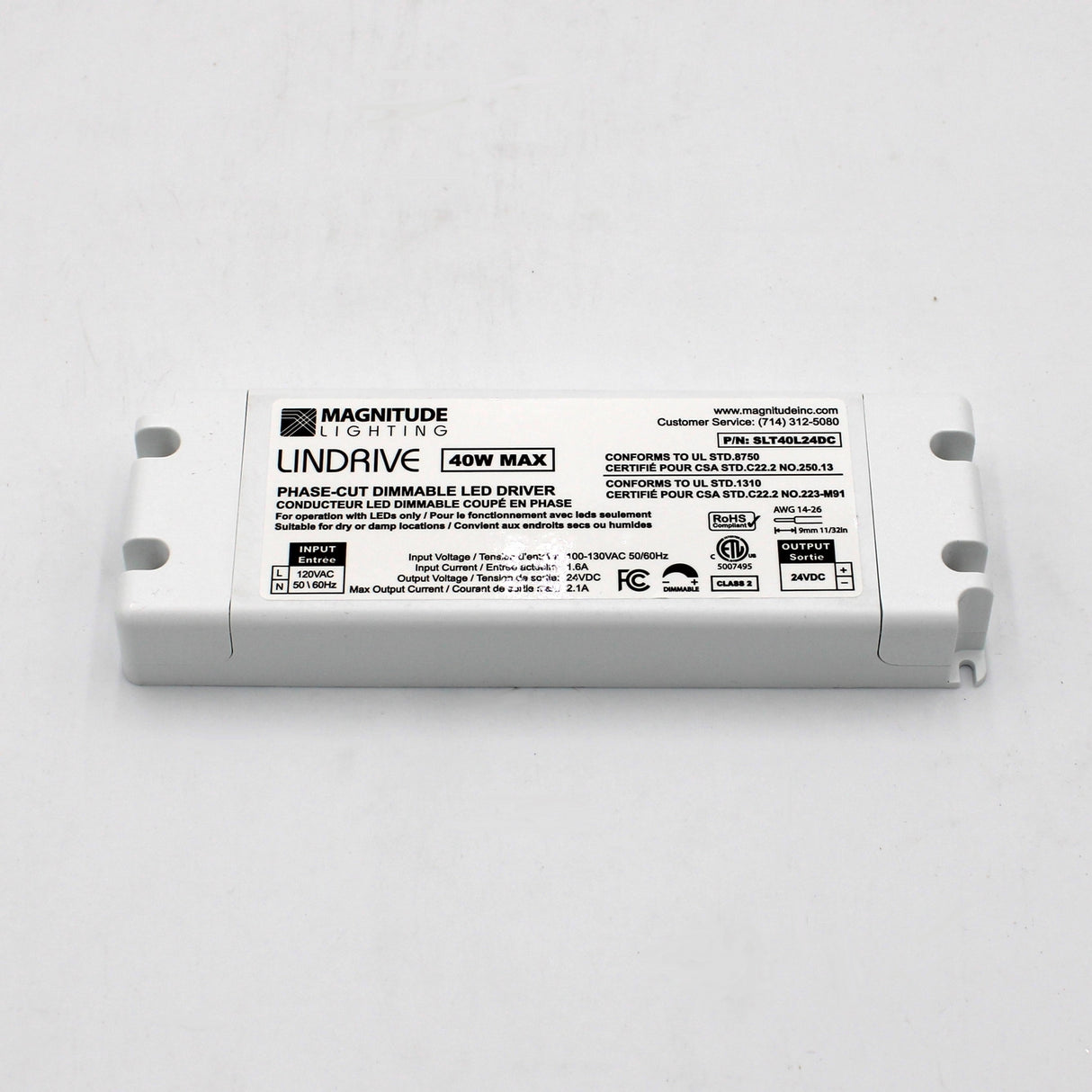 The Magnitude LinDrive Compact Electronic Phase Dimmable LED Driver (24V) features a rectangular white casing, 40W max output, safety compliance labels, certification icons, and wiring diagram—perfect for under cabinet lighting.