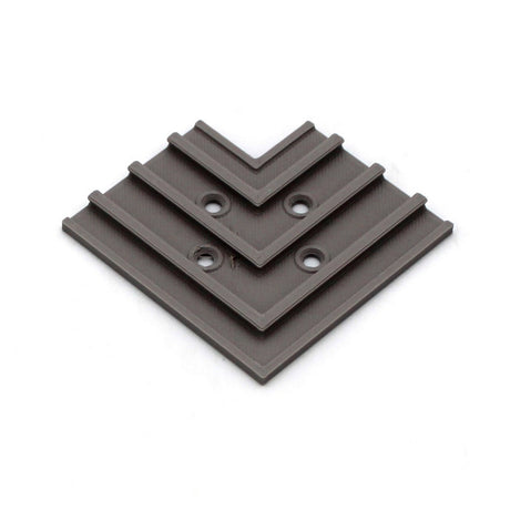 The 3D Printed Hidden Joiner and Bracket for SLW10 Profile is a gray, square metal bracket with three diagonal V-shaped ridges and four mounting holes—perfect for joining SLW10 profiles or as a hidden joiner solution.