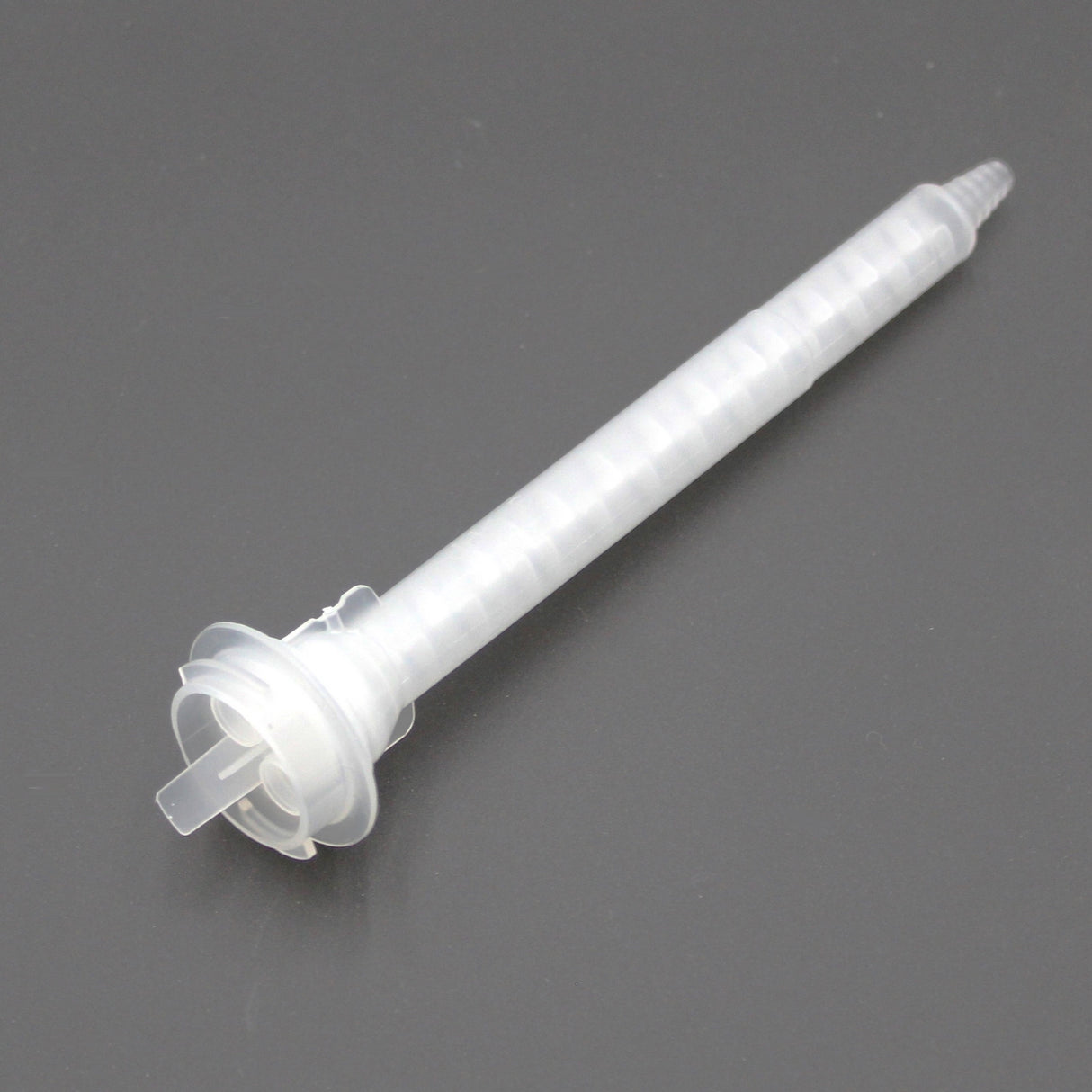 The Static Mixer for 2-Part Methacrylate 400ml 1:1 Mix ~ ACF-System Twist-Lock, a translucent nozzle with a spiral interior for adhesives, is shown on a dark background.