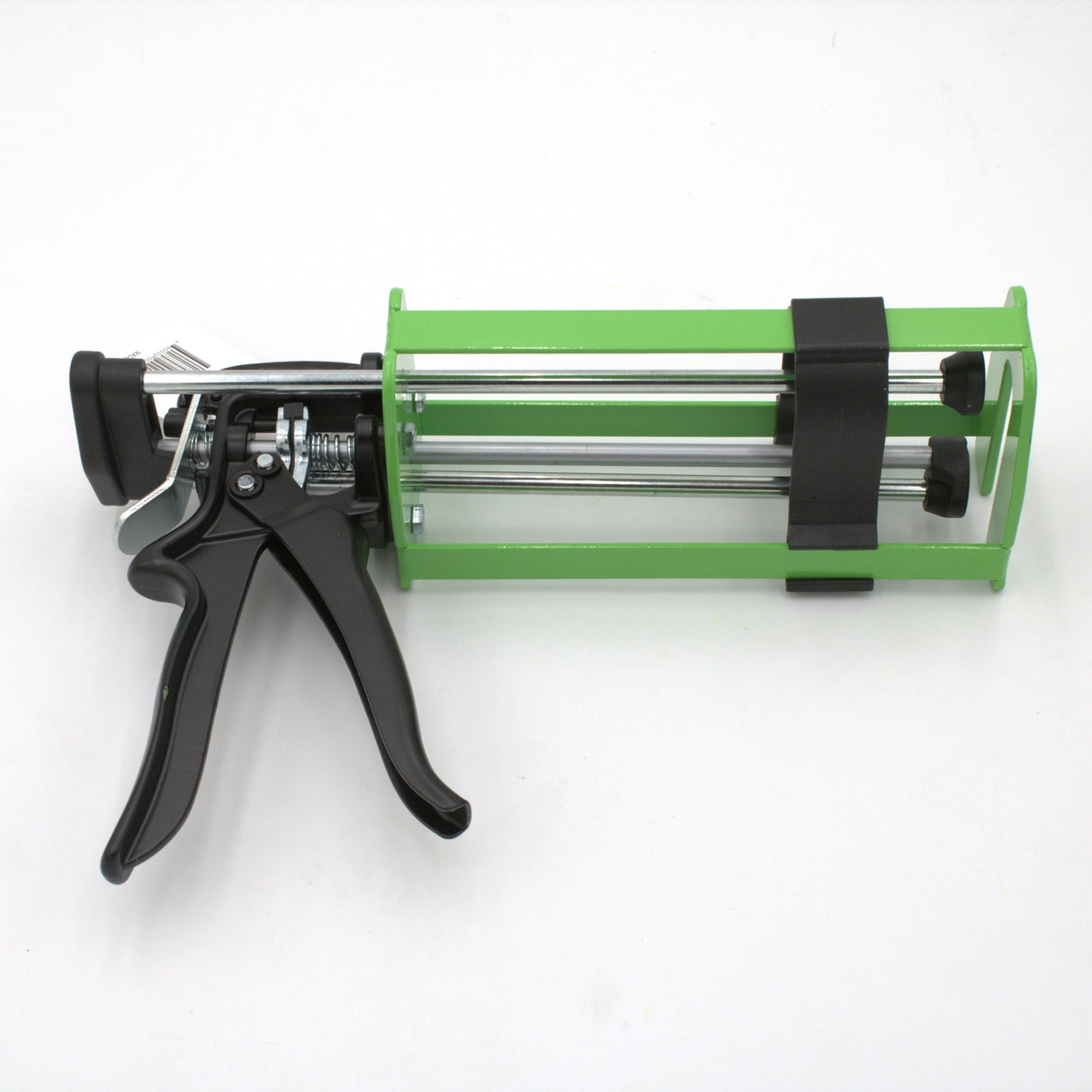 A Manual Cartridge Gun for Methacrylate 400ml 1:1 Mix with a green and black metal frame and two rods, designed for adhesive or sealant dispensing, is shown on a white background.