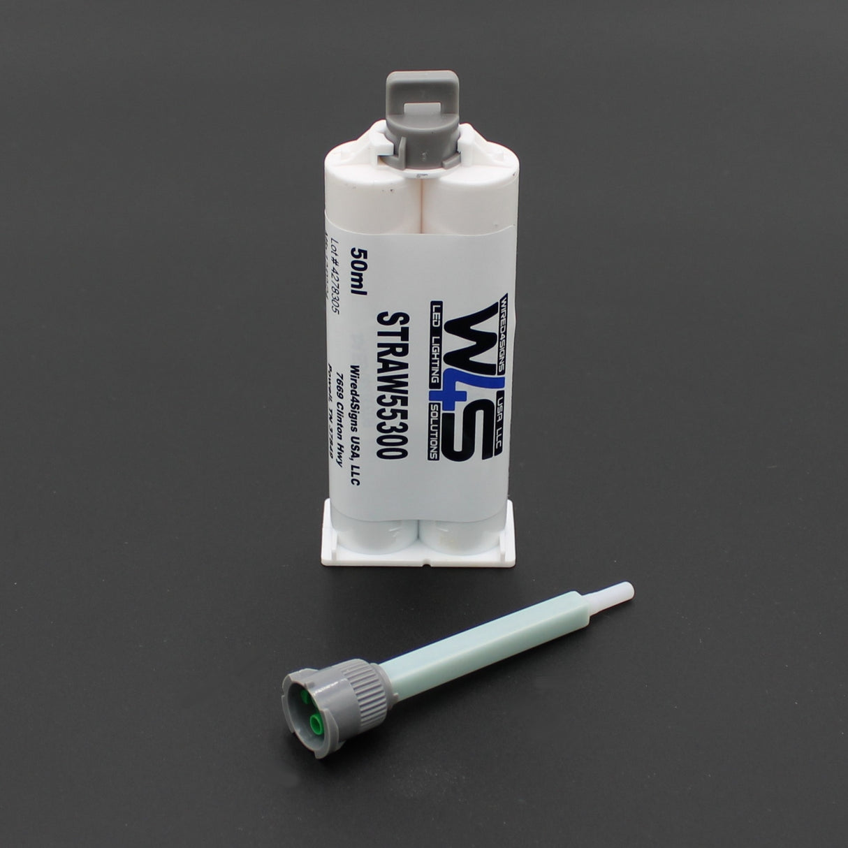 A 50ml Westech Cream 2-part Methacrylate Adhesive (W4S 55300, 1:1 Mix B-System) for bonding plastic features a front-facing plastic mixing nozzle, shown on a black surface.