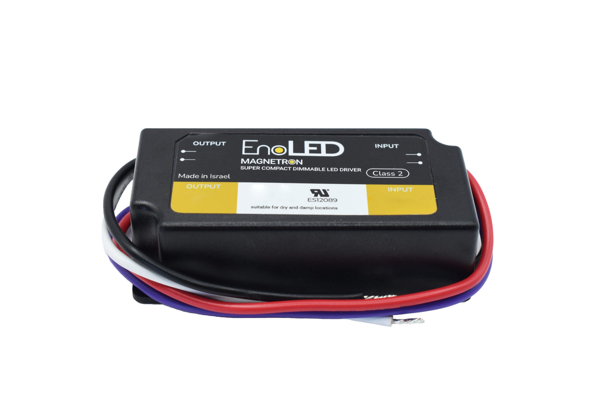 The EnoLED MRD Series Super Compact Dimmable Class 2 LED Driver (12V) features input/output terminals and red, blue, white, and black wires—ideal for powering 12V DC LED strip installations.