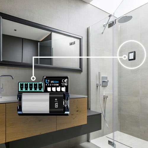 A modern bathroom featuring a glass shower, wooden vanity, and the Push Button Dimmer Switch Wi-Fi Insert ~ inBox by BleBox, seamlessly integrated on the shower wall to showcase advanced home automation.