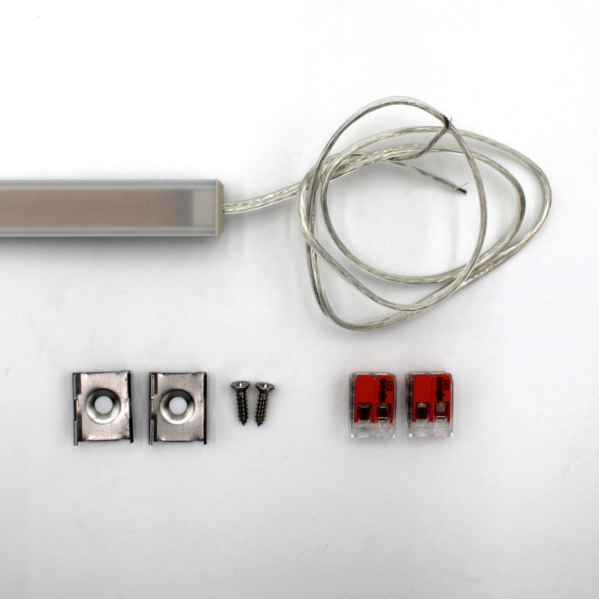 The White Universal Surface-mount Waterproof Outdoor LED Lighting Fixture (24V) ~ Roma Series comes with a transparent cable, two metal mounting brackets, screws, and wire connectors—ideal for outdoor surface-mount lighting.