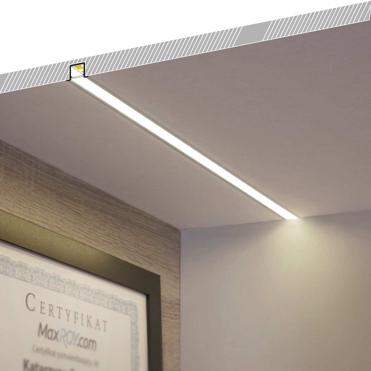The 0.39 Recessed LED Channel ~ Model Smart-In10 is installed in the ceiling with LED strip lights, creating a bright, dot-free line of light. A section of the ceiling is cut to show a cross-section, and a framed certificate hangs below.