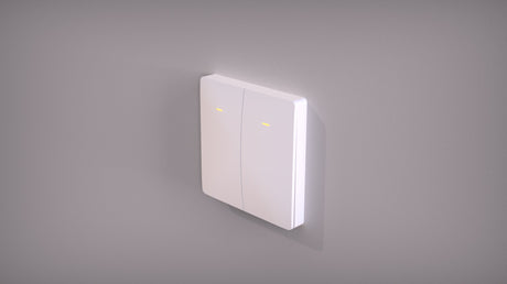The Casambi Wireless Battery-Operated 2-Button Wall Switch (Eulum SWC-CSB-2R-W) features dual programmable buttons and yellow indicator lights for easy wireless lighting control, shown mounted on a simple gray wall.