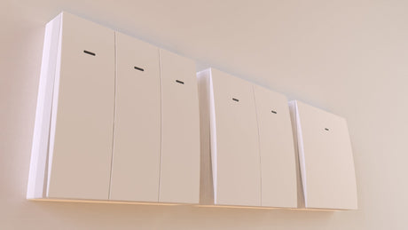 Four sleek, minimalist white Casambi Wireless 2-Button Wall Switches (Eulum SWC-CSB-2R-W) with small black horizontal slots are mounted side by side on a light beige wall.