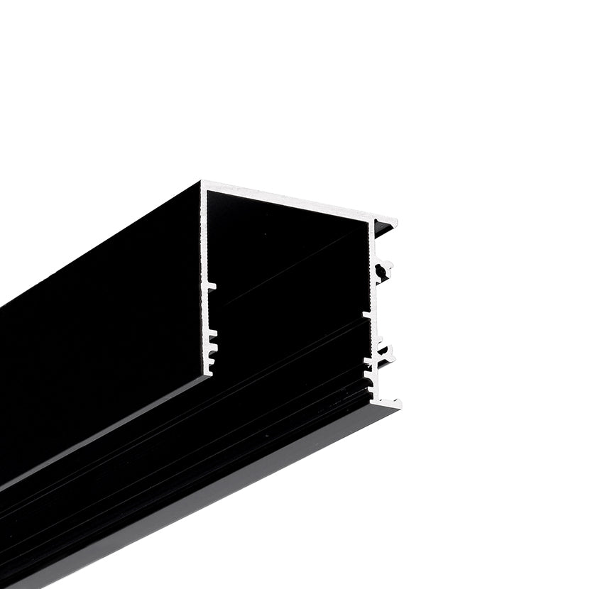 Close-up of the 1.3" Surface Mount Side-Lighting LED Channel (Model Vario30-03), a black aluminum profile with a rectangular hollow shape and side grooves for architectural lighting, shown against a white background.