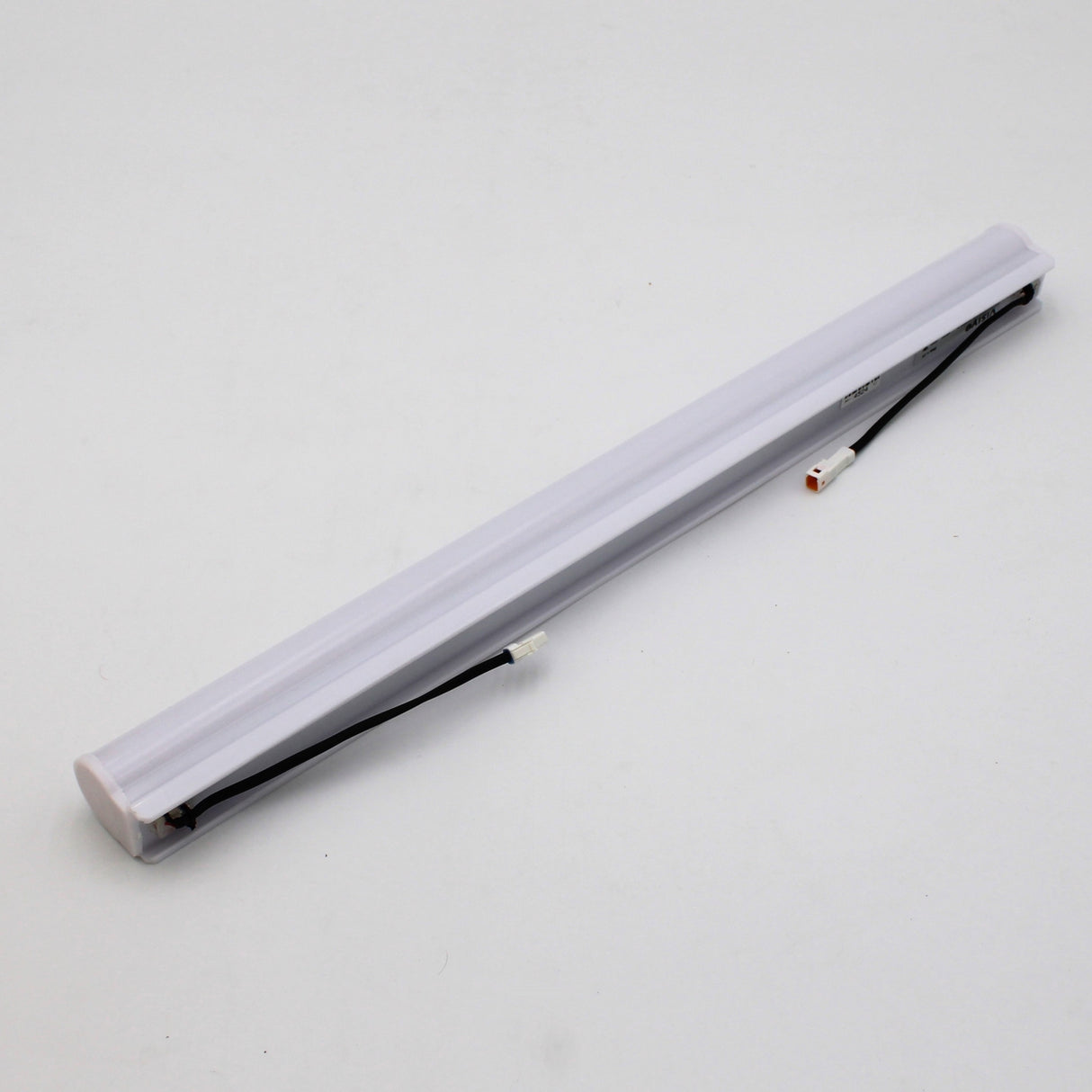 The White Border Contour Tube Light ~ Hi-Lite 30 Straight Section, a slim, rectangular LED fixture with a white casing and black wires on one side, is shown on a plain white surface, ideal for building illumination.