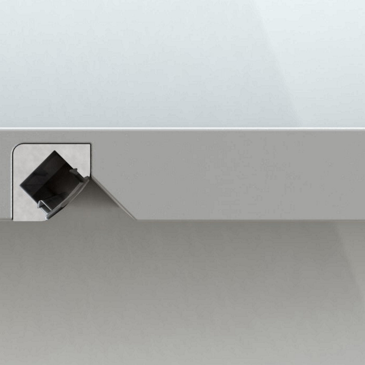 A close-up of a gray surface with a single black Ethernet port on the left features the 45 Degree Corner Mount LED Channel (Model ALU-45), designed for sleek, modern LED lighting; the background is smooth and plain.